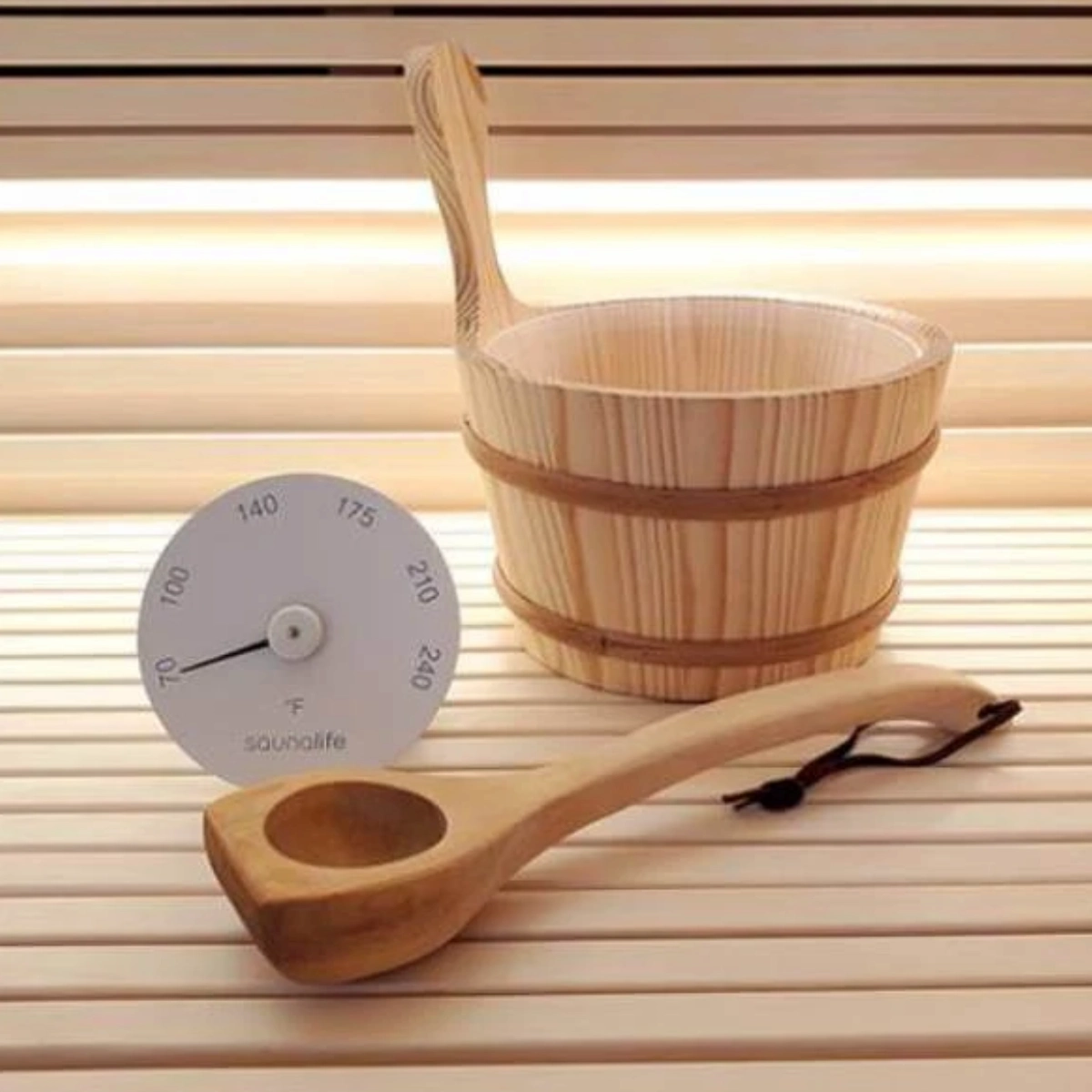 SaunaLife Accessory Package 4 bucket, ladle and thermometer inside a sauna