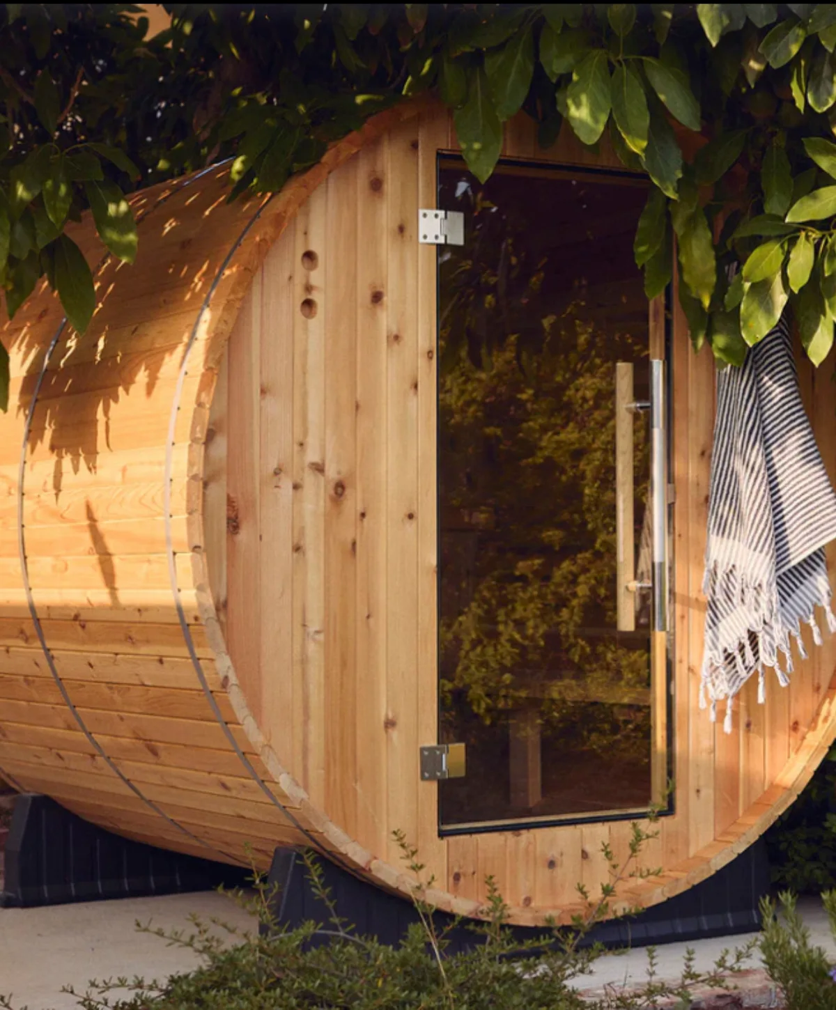 Almost Heaven outdoor barrel sauna installed in a backyard setting