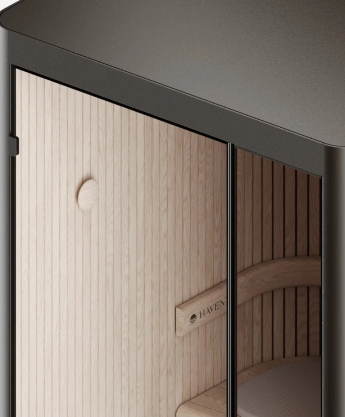 Haven Sauna exterior with dark aluminum panels and wood interior